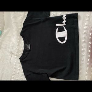 Women’s Black Champion Cropped tee shirt.